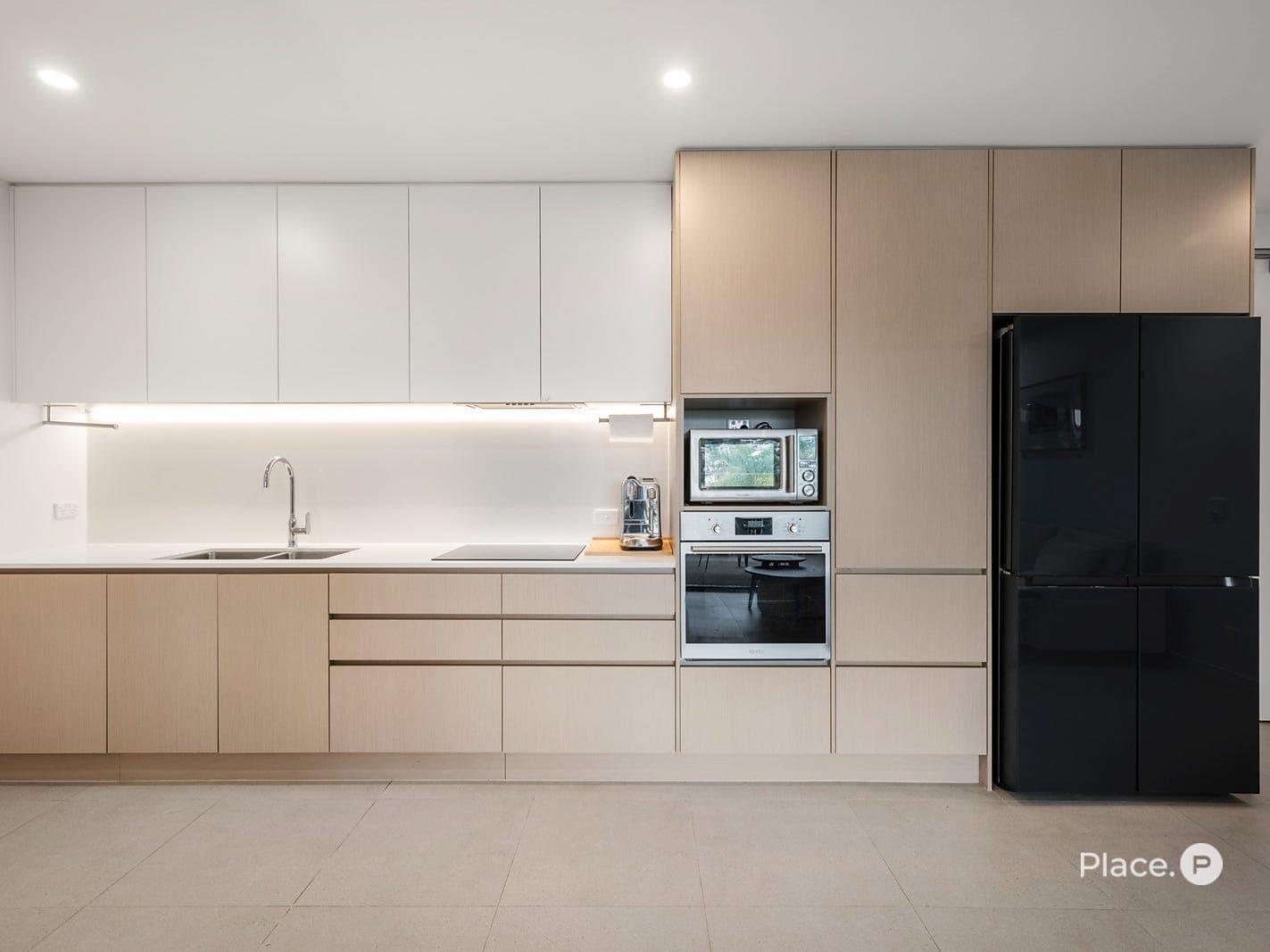 Designer kitchen — stone benchtops, premium Ilve appliances and ample cabinetry