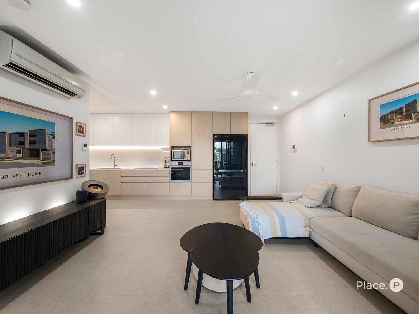 Open-plan living and dining flowing through to the designer kitchen