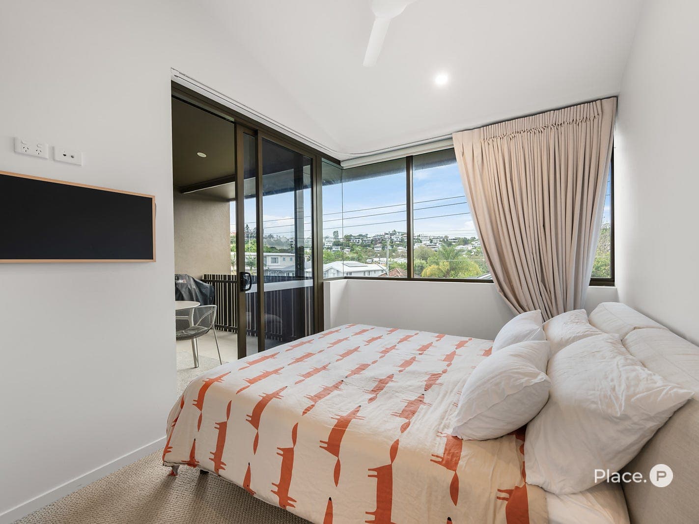 Master suite with balcony access and elevated views across Balmoral Hill
